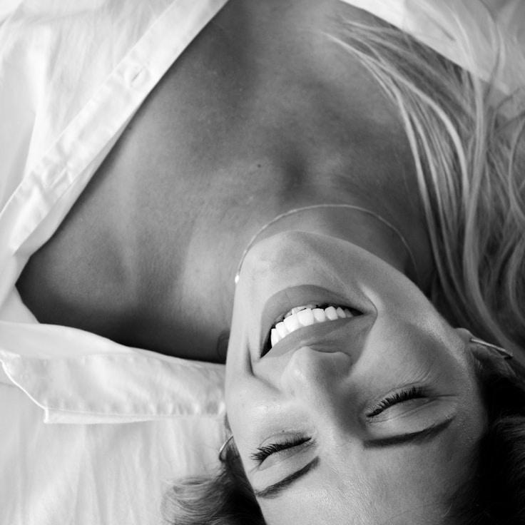 Kaveri Mehta, Lead Design Curator at CiderWavePath, reviewing corporate floral arrangements